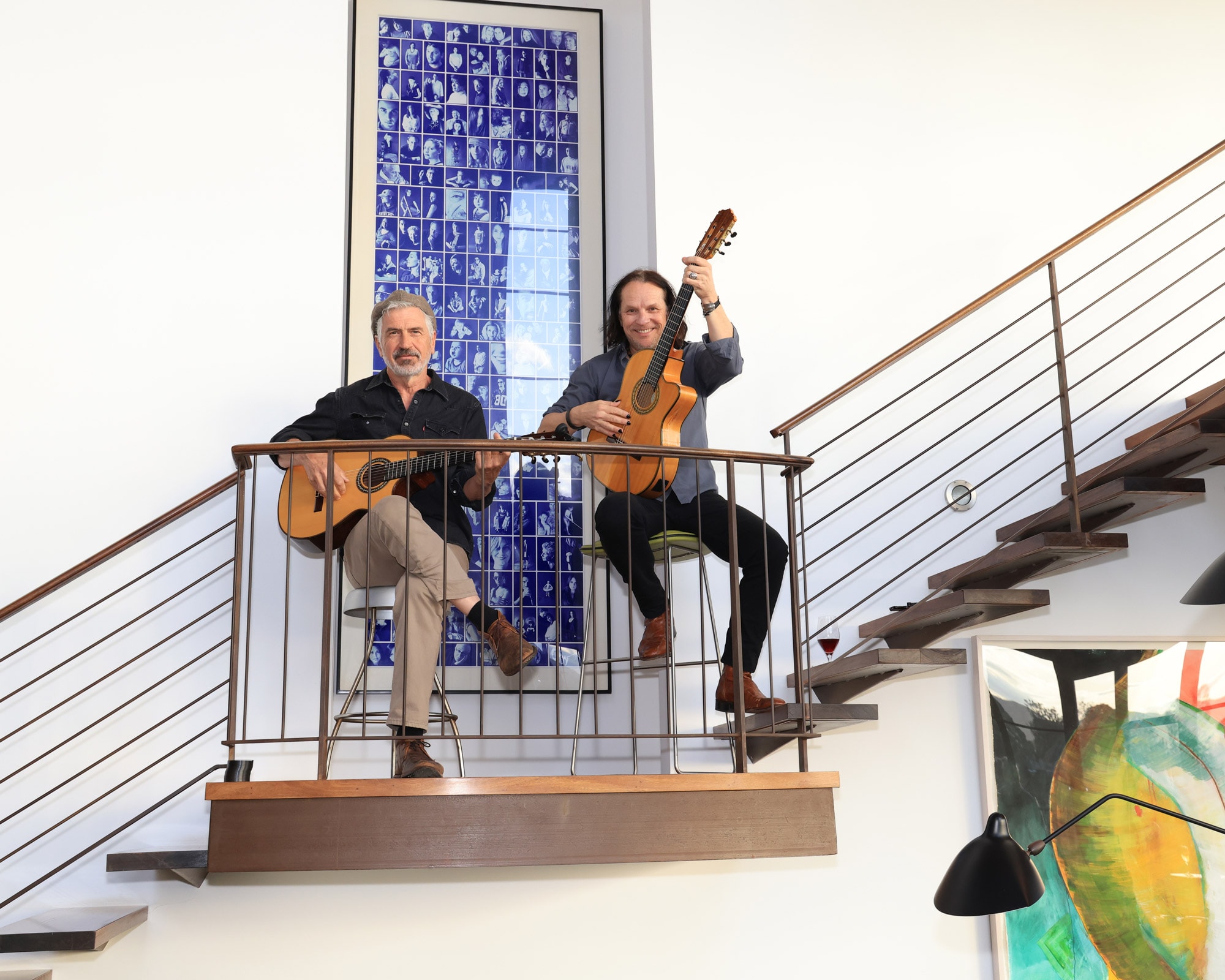 A photograph of Venice Design Series Santa Monica Dinner Party guitar players on the staircase