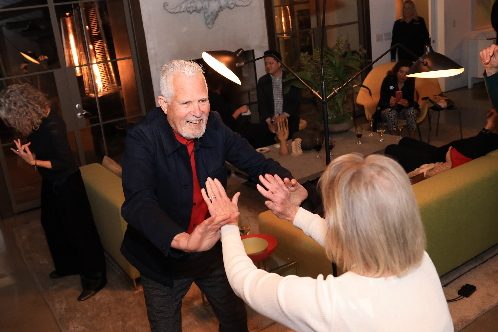 A photograph of Venice Design Series Santa Monica Dinner Party guests dancing